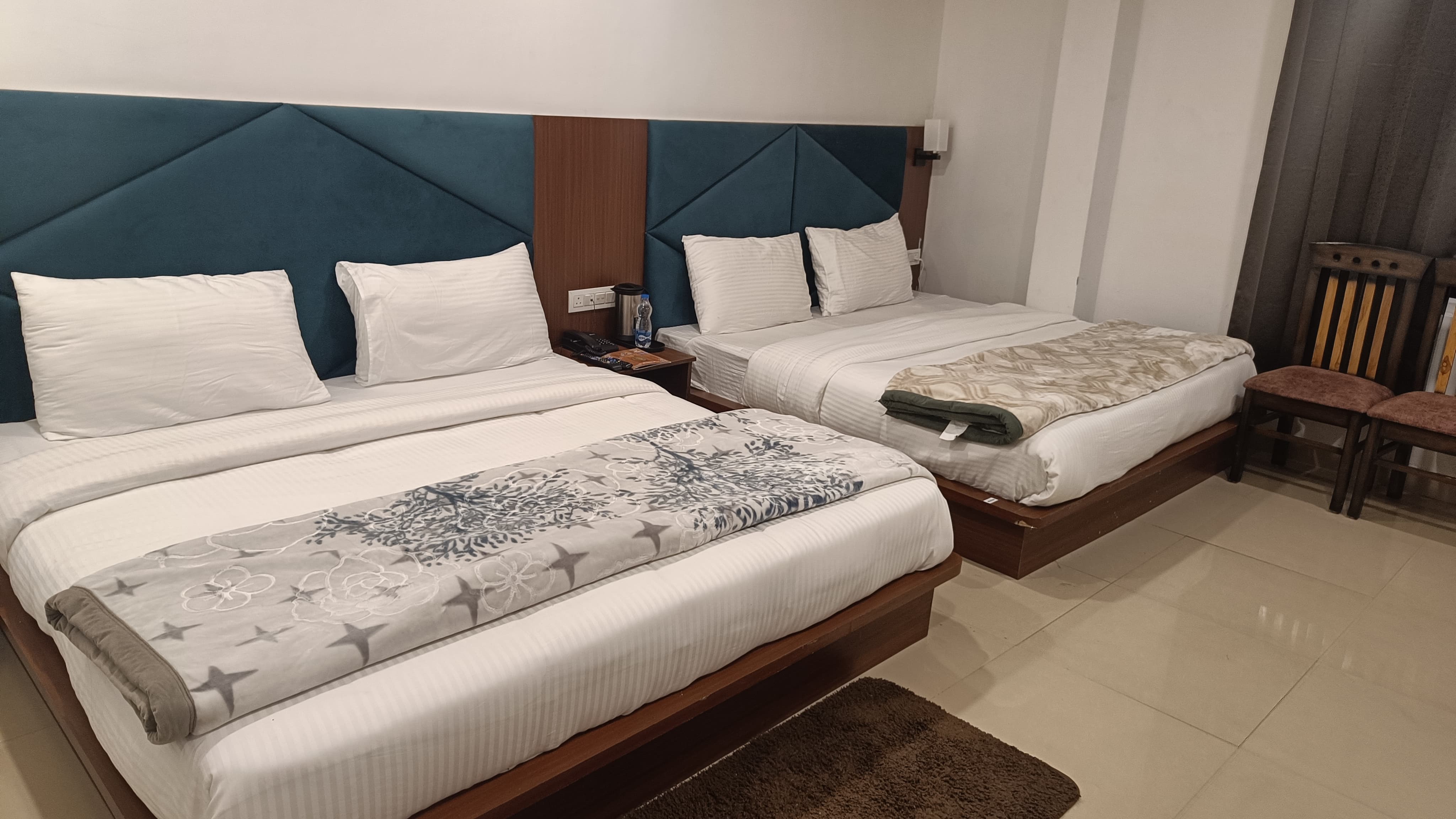 Four Bed Family Room comfortable at Vijay Lords Centric top hotel near Badrinath Temple